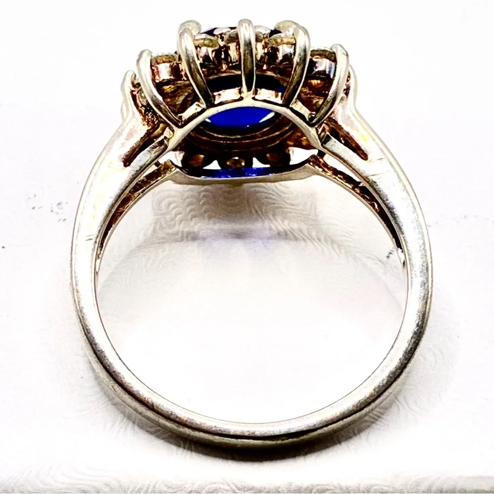 VTG Signed JC Oval Cut Cubic Zirconia Sapphire with Halo of CZ’s In Silver Tone